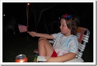 A tired girlie waiting on fireworks