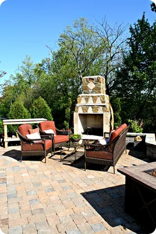 stone patio and outdoor fireplace