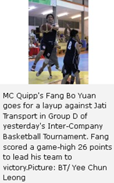 MC Quipp's Fang Bo Yuan goes for a layup against Jati Transport in Group D of yesterday's Inter-Company Basketball Tournament. Fang scored a game-high 26 points to lead his team to victory.Picture: BT/ Yee Chun Leong 