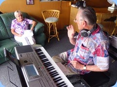 Karen Steen enjoying a moment with husband, Roy, who is playing his Korg Pa80.