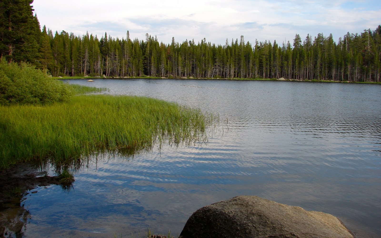 Our Four Wheel Camper Burnside Lake "echoing off the rocks above our