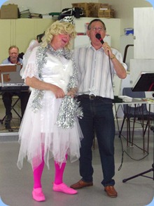 Fiona, the fairy, enchanting Len Hancy as he sang to the Prescott Club members. Peter Brophy, the North Shore Organ and Keyboard Club's Events Manager, appeared at the start of the show but then disappeared. I wonder what Fiona's surname is?