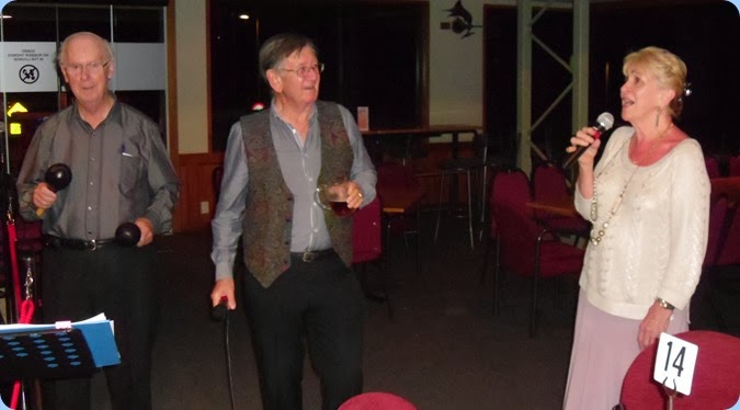 Over to you Margaret Black! Margaret leading the vocals in the curtain raising finale whilst Peter Brophy and Len Hancy provide support.