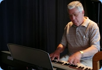 Jim Nicholson playing the Club's Korg SP-250 digital piano. Photo courtesy of Dennis Lyons