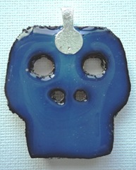 Beaded skull pendant