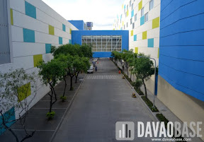 The bridge linking SM City Davao to The Annex is located above the mall compound's pathways