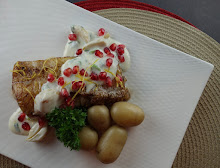 Pan-Seared Cod with Lemon Yogurt Sauce, Poached Garlic and Pomegranate