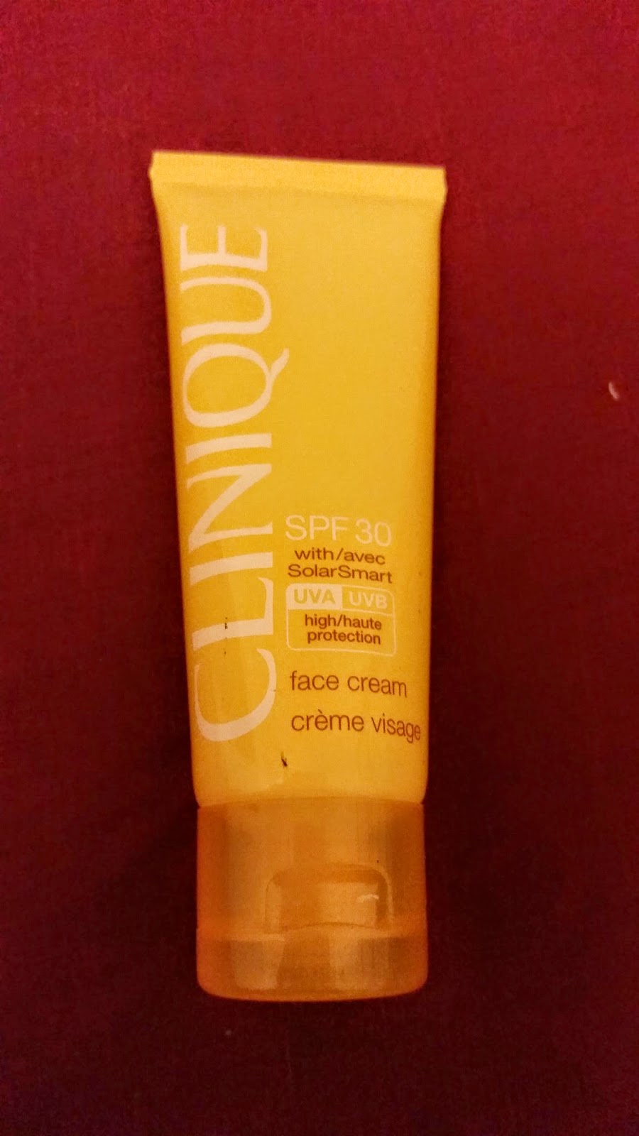 pretty in peach Clinique face sun cream