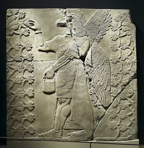 Relief of Eagle-Headed Winged Figure Standing Between Two Sacred Trees