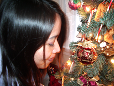 c0 Jing looking at our Christmas tree in Erie, 2008