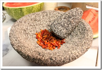 Hot Piquín Pepper Powder | Peppers in Molcajete