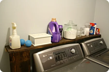 shelf behind washer and dryer for storage