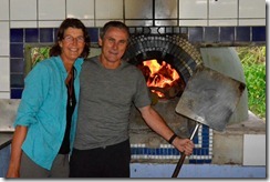 Pizza making in a woodfired oven.