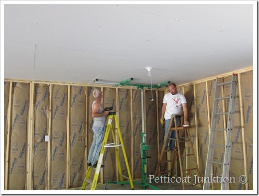 Last piece of sheetrock goes up Petticoat Junktion workshop construction