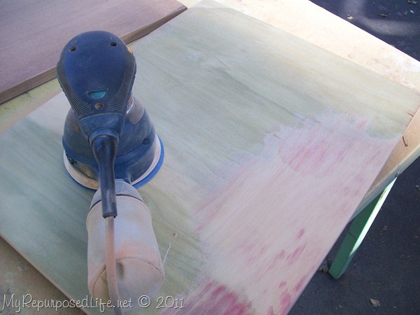 sanding away veneer on sewing cabinet