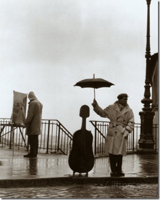 robert-doisneau-musico-bajo-la-lluvia