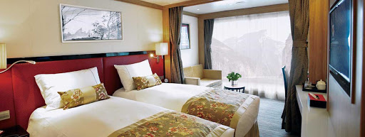 Uniworld-Century-Legend-stateroom - Relax in style and comfort throughout your cruise of China aboard Uniworld's Century Legend. 