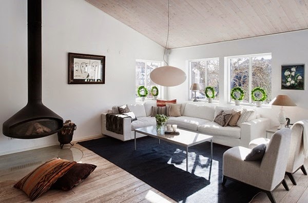 swedish-home-style-with-hanging-fireplace-and-black-carpet-also-white-sofa