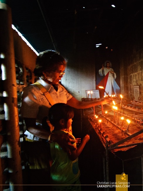 Saying a Prayer at Bolinao Church in Pangasinan