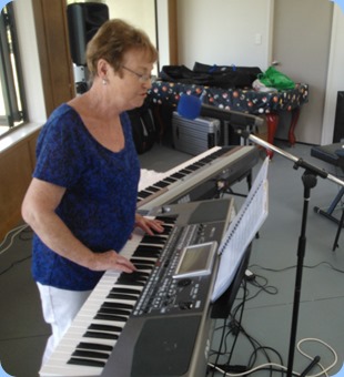 Our Events Manager, Diane Lyons, playing and singing using her Korg Pa900.