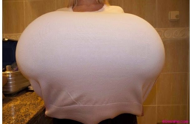 O.M.G: Meet lady with the largest fake boobs [See photos]