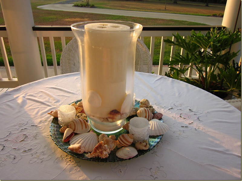 large shell candle outside