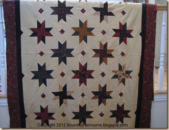 new star quilt with caption