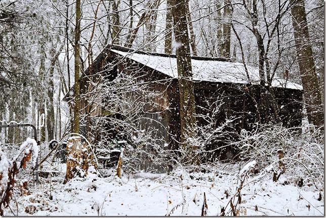 rustic barn in snow