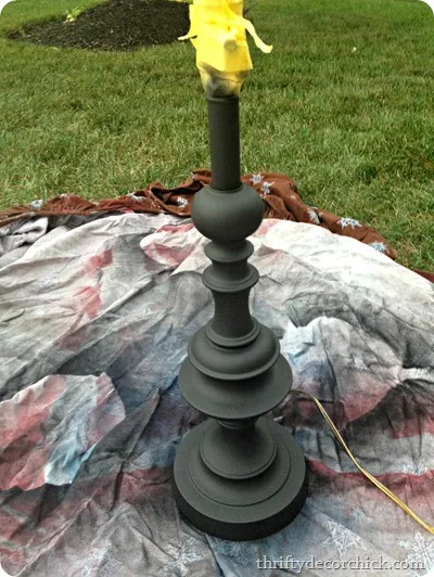 spray painting a lamp