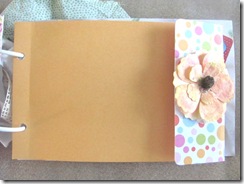 Cape Kellys birthday book orange envelope page with flower