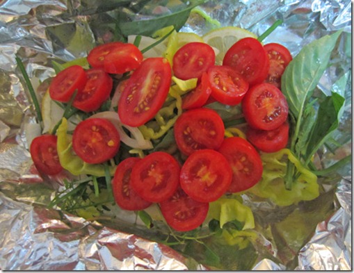 Foil-baked bluefish with tomatoes and herbs