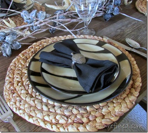 Modern take on a rustic tablescape using antlers and zebra print
