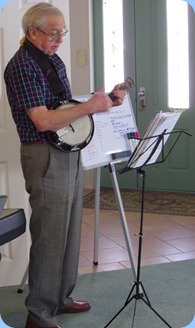 Gordon France playing his Eukulele-Banjo with vocals