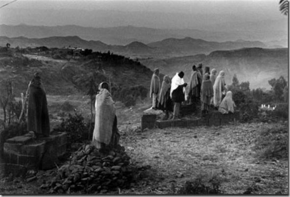 Thousands of Christians pilgrimate to Lalibela, its a religious promise that Ethiopian Orthodox  must do  at least once  before dying. Most of them are very poor farmers coming from isolated areas on foot during days, weeks passing hunger and cold nights at open air. 