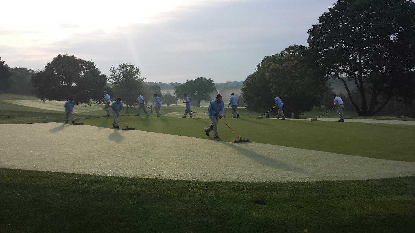 Square Golf and Country Club Brushing greens