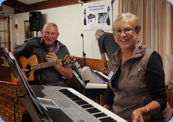 Jan and Kevin Johnston playing acoustic guitar and Korg Pa1X. Photo courtesy of Dennis Lyons