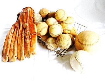 Old baseballs and glove Old baseballs and glove