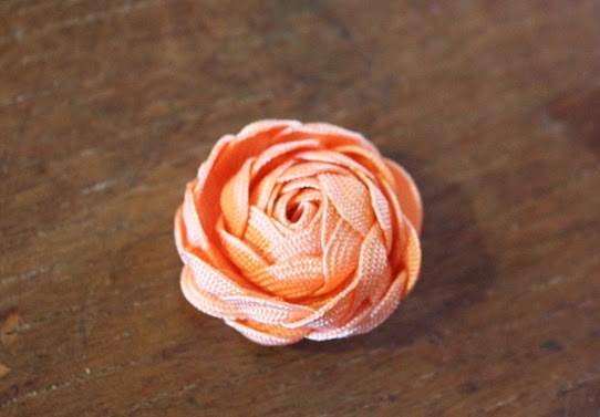 Unfurling the petals to a full rose - How To Make Ric-Rac Rose Jewelry | Lavender & Twill