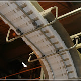 Greiferbahn mit Zeitungen