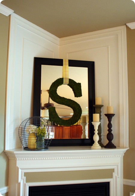 A mirror over the mantel from Thrifty Decor Chick