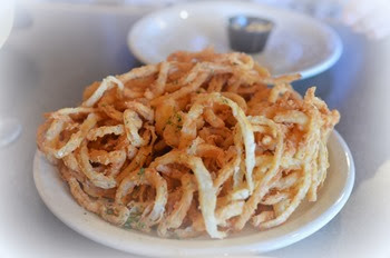 something extra tasty about these onion rings and spicy tartar sauce