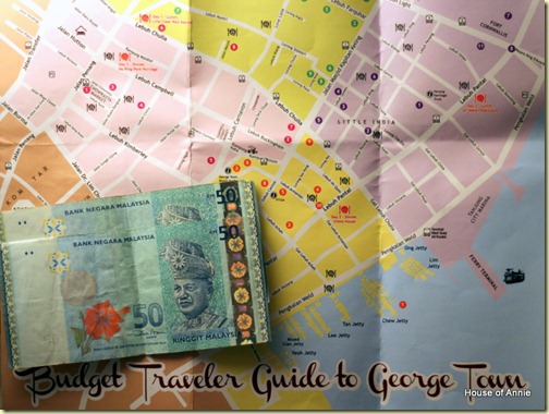 A hundred ringgit and a map of Georgetown, Penang