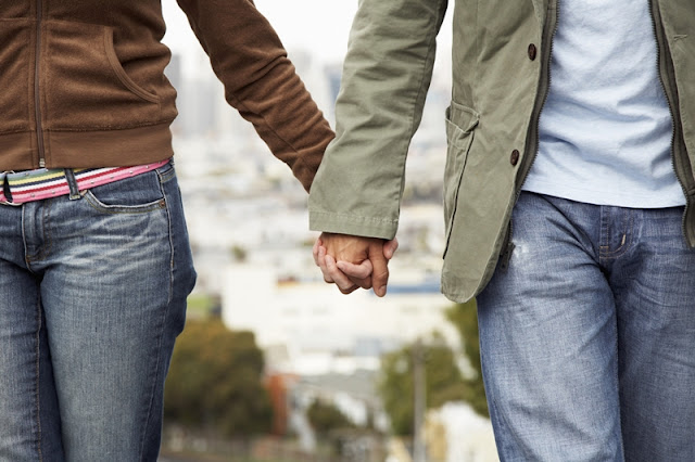 Couple Holding Hands --- Image by © Royalty-Free/Corbis