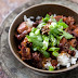 Hank introduced me to this Brazilian black bean stew a couple months ago and I couldn’t stop eating it