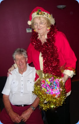 Master puppeteer and Santa, Jeanette Beamish, working Ian Jackson!