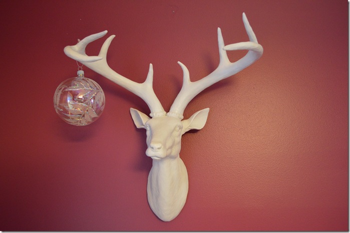 Hang an ornament on an antler for Holiday Flair