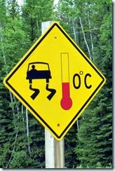 Roadside sign (bridge freezes at 32F / slippery)