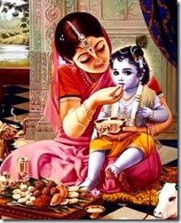 Mother Yashoda feeding Krishna