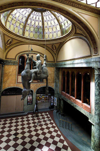 "Horse," a statue of Good King Wenceslas at Prague's Lucerna Palace shopping area, was created by David Černý, a Czech sculptor known for his provocative work.