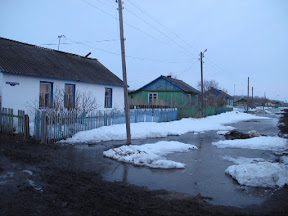 Прострелила голову два раза.